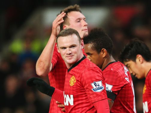 Wayne Rooney: Not getting carried away with title talk