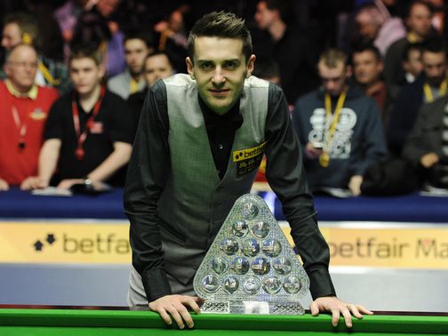 Mark Selby poses with the Masters trophy.