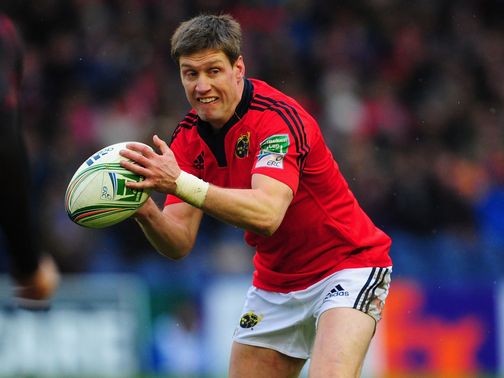 Ronan O'Gara looks to get a quick pass away