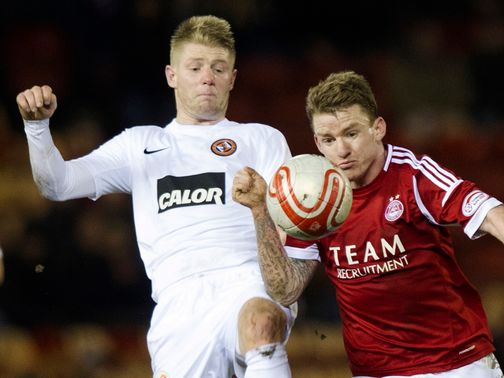Stuart Armstrong tackles Jonny Hayes