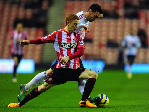 Jack Colback and Chris Eagles battle for the ball