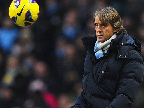Mancini: Hoping to close the gap on Manchester United