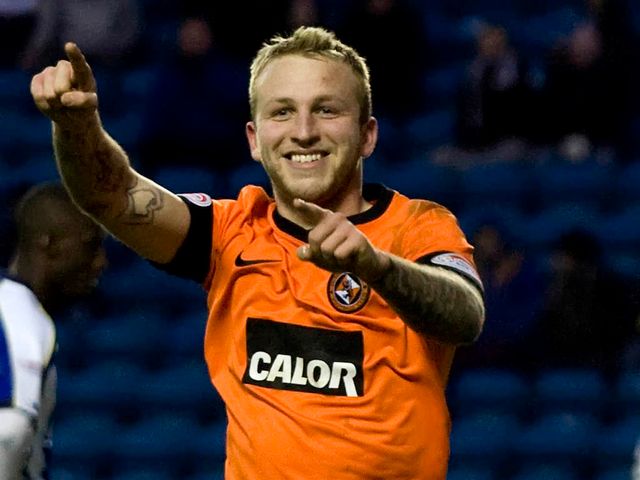 Johnny Russell scored a hat-trick for Dundee United