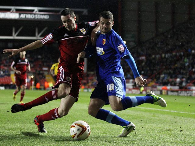 Brendan Maloney and Daneil Pudil battle for the ball