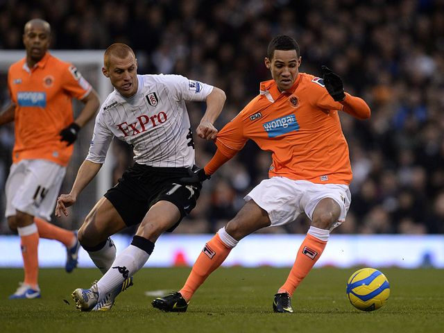 Sidwell and Ince battle for the ball