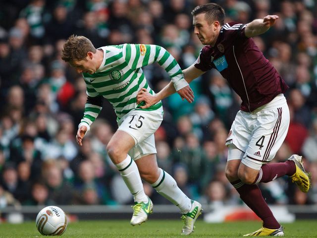 Kris Commons gets away from Danny Wilson