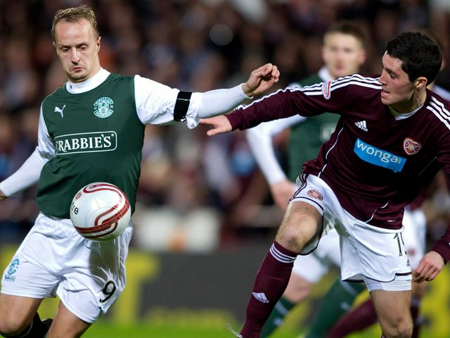 Leigh Griffiths and Dylan McGowan vie for the ball