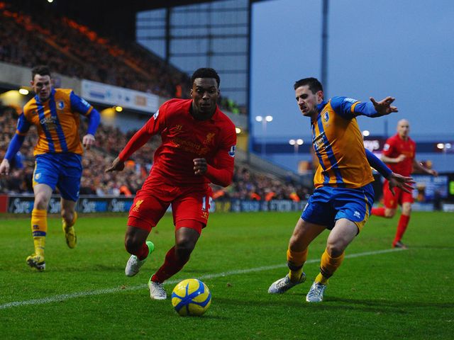 Daniel Sturridge tries to get past Chris Clements