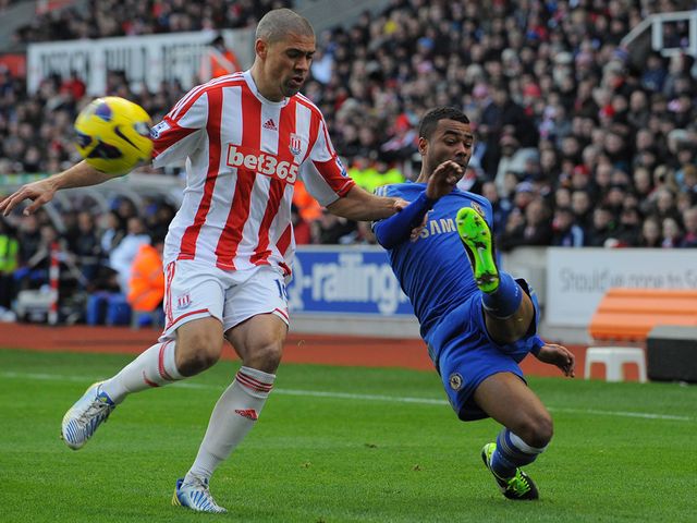 Jon Walters tries to stop Ashley Cole