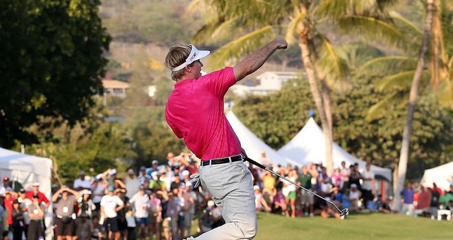 Russell Henley: Celebrates a birdie at the 18th