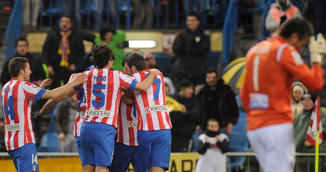 Atletico Madrid celebrate Koke's goal.