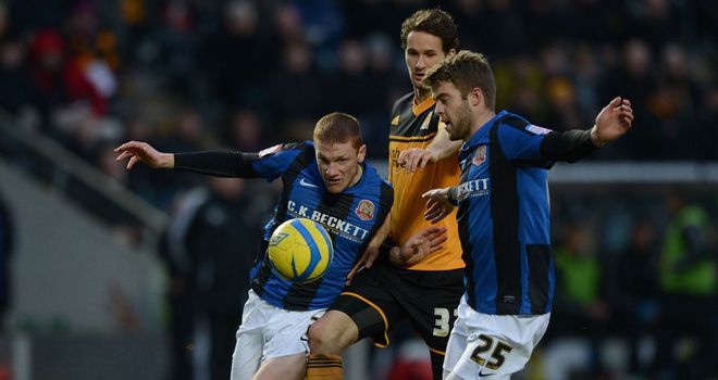 Action from the fourth round all-Championship clash
