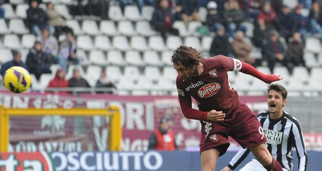 Rolando Bianchi heads home Torino's second goal
