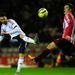Bolton's Chris Eagles gets in a shot at goal despite the attentions of Craig Gardner