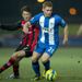 Bournemouth's Harry Arter keeps a close eye on Wigan midfielder Fraser Fyvie