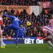 Jon Walters heads into his own net to give Chelsea a 1-0 lead at Stoke just before the break