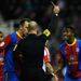 Wilfred Zaha is shocked after being booked for diving by referee Anthony Taylor
