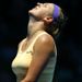 Victoria Azarenka came through an epic struggle with injury-stricken Jamie Hampton early in the day.