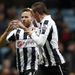 Yohan Cabaye celebrates after his scorching strike for Newcastle doubles their advantage at Villa Park