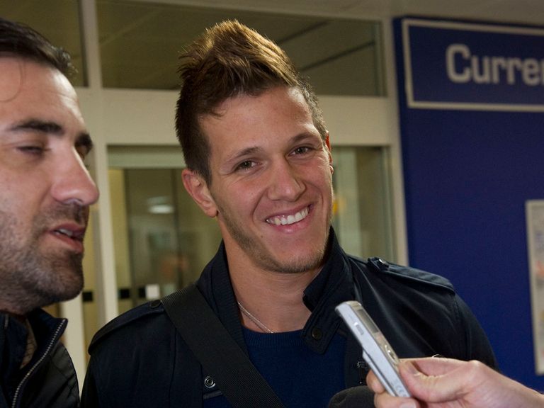 Rami Gershon speaks to the press at Glasgow Airport