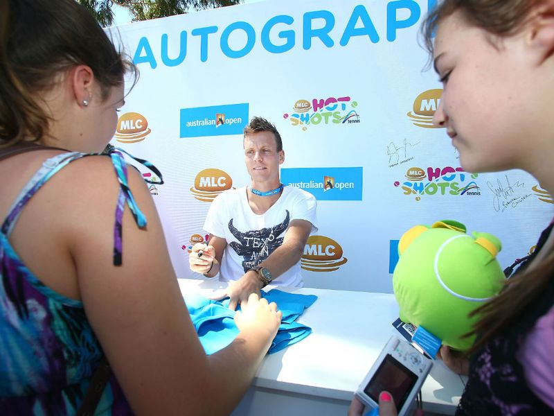 Tomas Berdych signs autographs for his fans