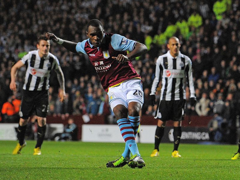 Christian Benteke pulls a goal back for Villa after the break from the penalty spot