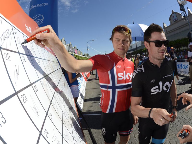 Edvald Boasson Hagen and Chris Sutton sign in ahead of the start in Unley