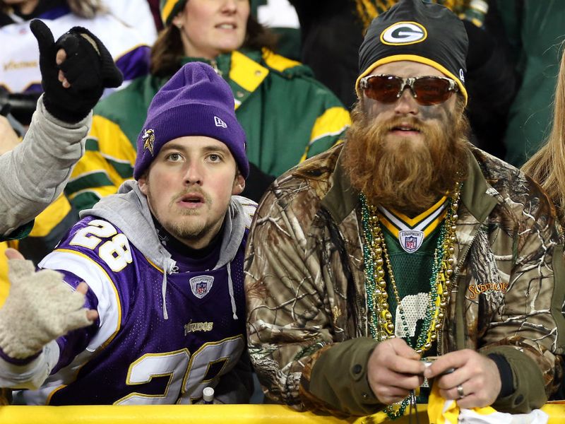 The fans of the Minnesota Vikings and Green Bay Packers braved the cold at Lambeau Field for Saturday's second game...