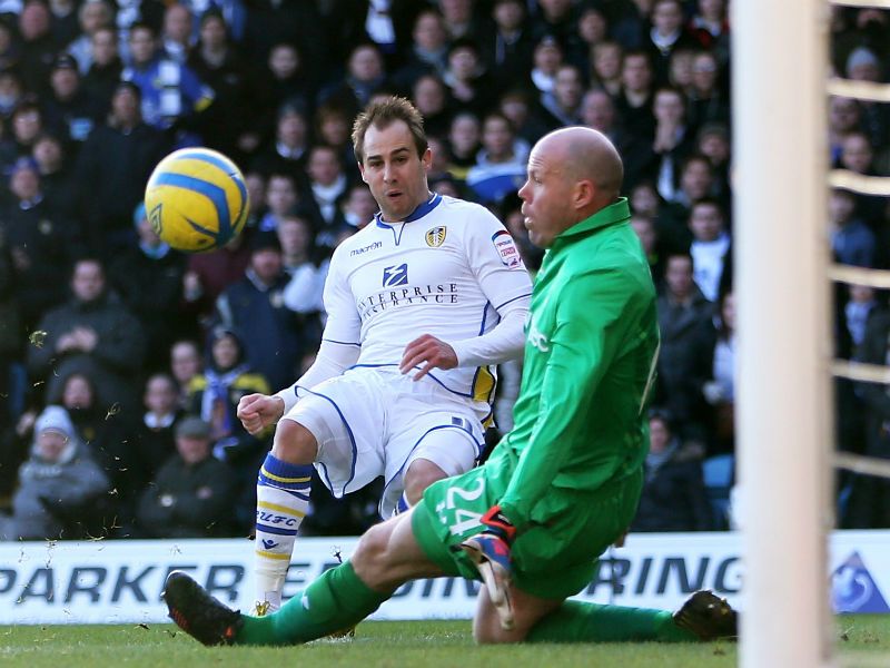 Opening strike: Luke Varney of Leeds scores the opening goal as the Championship side shock Spurs 2-1 at Elland Road