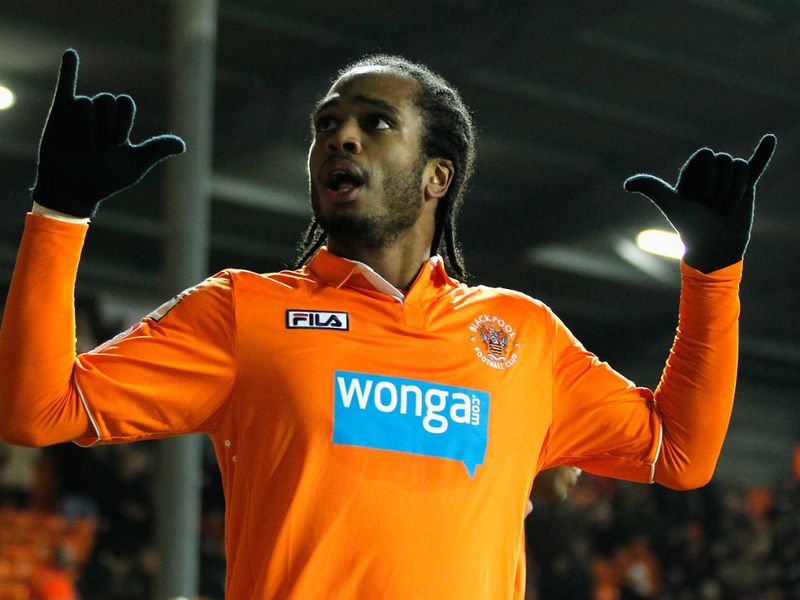 Striker Nathan Delfouneso is happy after bagging the opening goal for hosts Blackpool