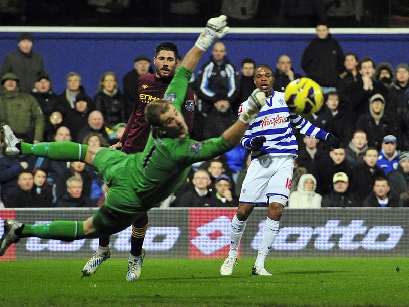 Joe Hart is relieved to see Loic Remy's shot flash wide of the post