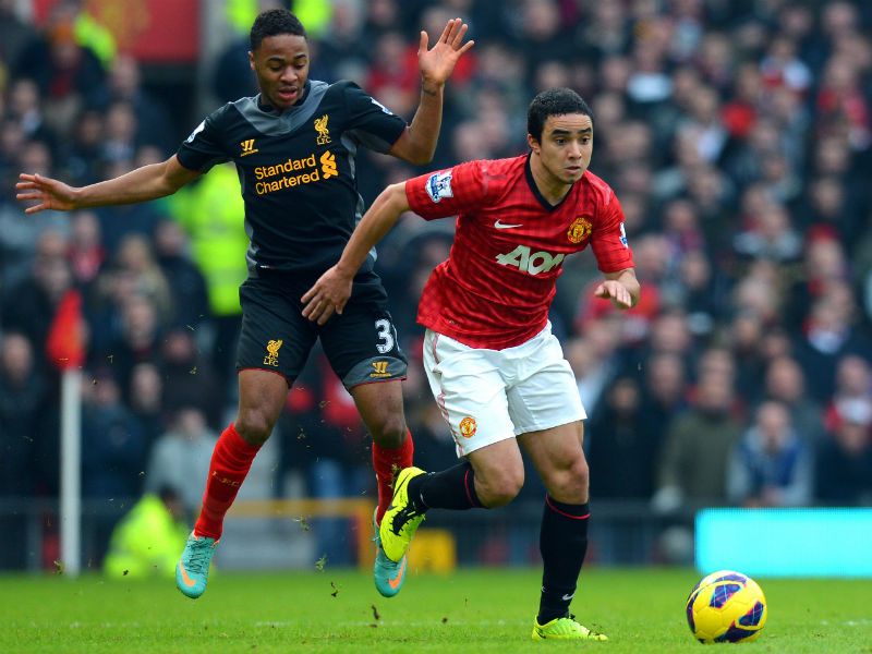 Trying their best: Rafael is challenged by Raheem Sterling