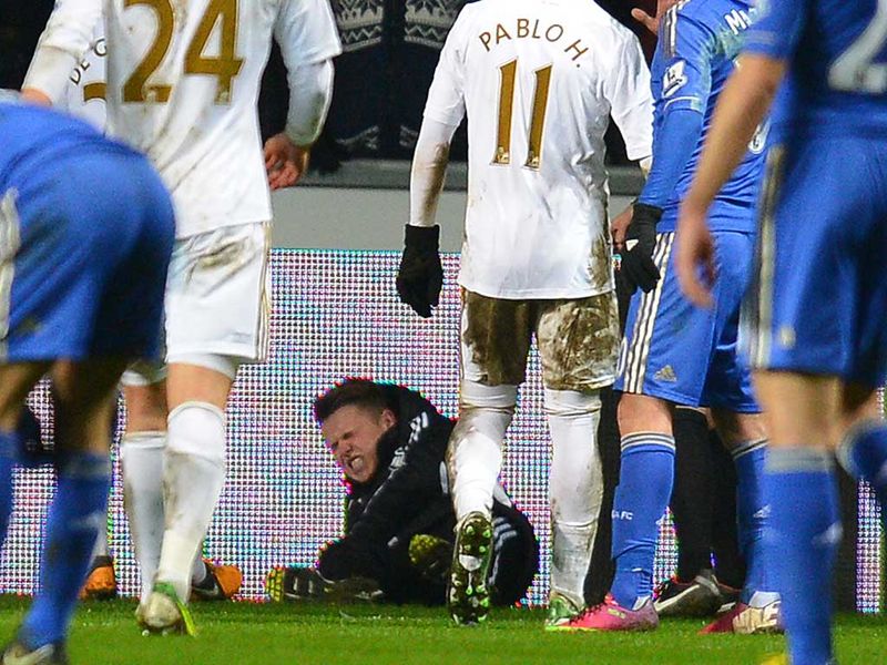 A ball boy is left on the ground after tussle with Hazard which led to the Belgian's bizarre sending off for Chelsea.