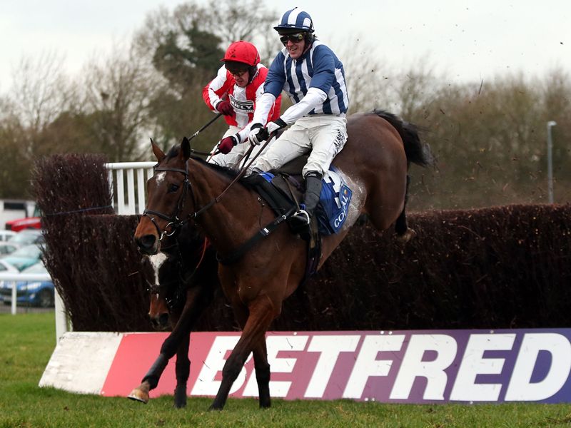 Teaforthree and Monbeg Dude jump the last together in the Welsh National