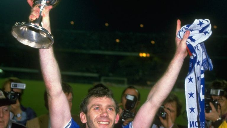 Toffees glory: Reid lifts the European Cup Winners' Cup with Everton in 1985