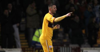 Michael Higdon: Celebrates his winner against Celtic