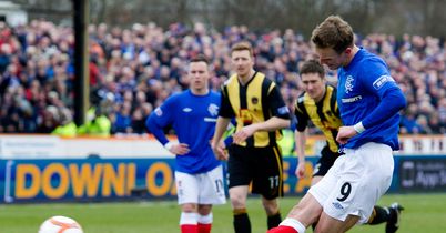 Dean Shiels scores Rangers' first goal during a 3-1 victory at Berwick