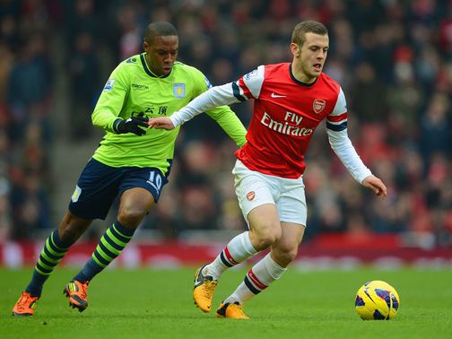Jack Wilshere tries to break clear from Charles N Zogbia