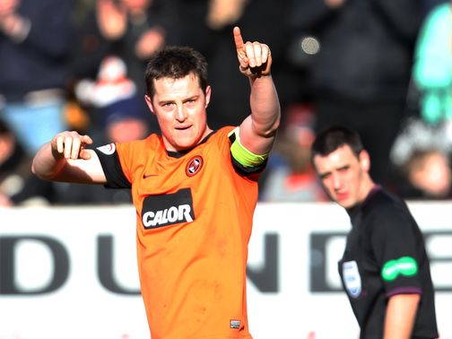 Jon Daly celebrates his goal.
