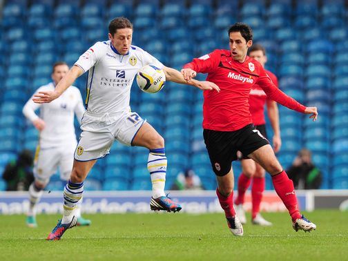 Michael Brown and Peter Whittingham tangle.