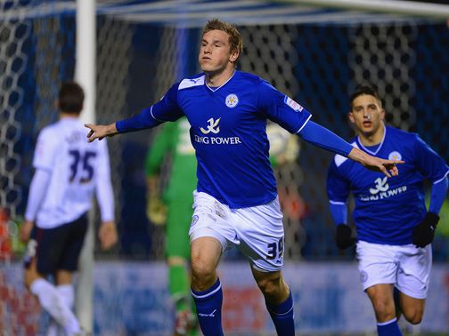 Chris Wood celebrates scoring the first goal for Leicester