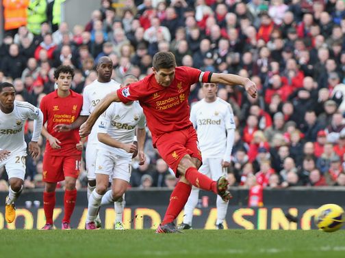 Steven Gerrard's penalty put Liverpool 1-0 up against Swansea in the day's only Premier League game.&nbsp;