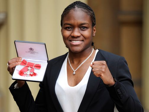Nicola Adams shows off her MBE
