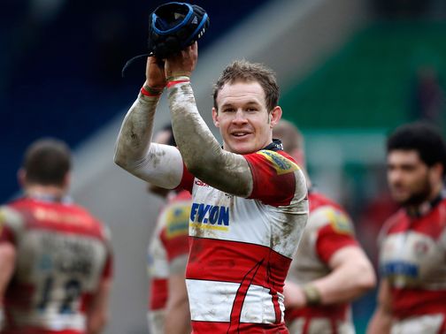 Rob Cook acknowledges the travelling fans