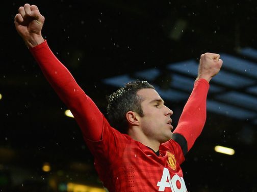 Robin van Persie celebrates his goal at Old Trafford