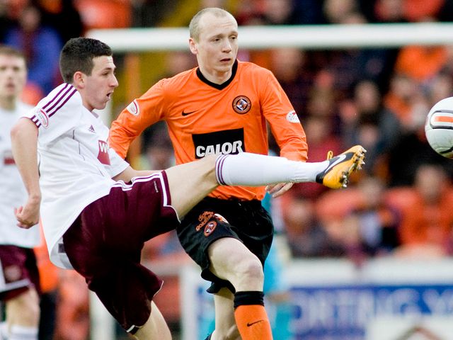 Jason Holt and Willo Flood battle for possession