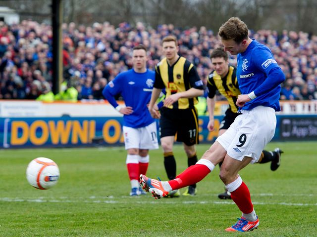 Dean Shiels scores Rangers' equaliser from the spot