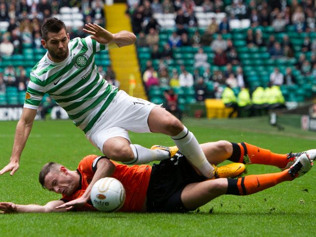 Joe Ledley takes a tumble.