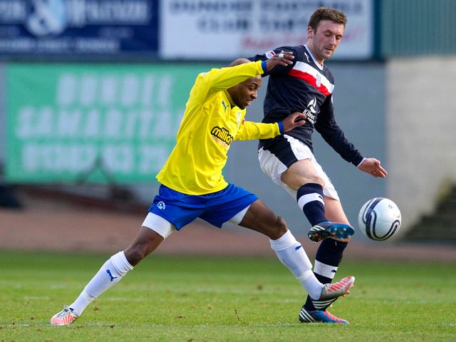 Kevin McBride is closed down by Fouad Bachirou.