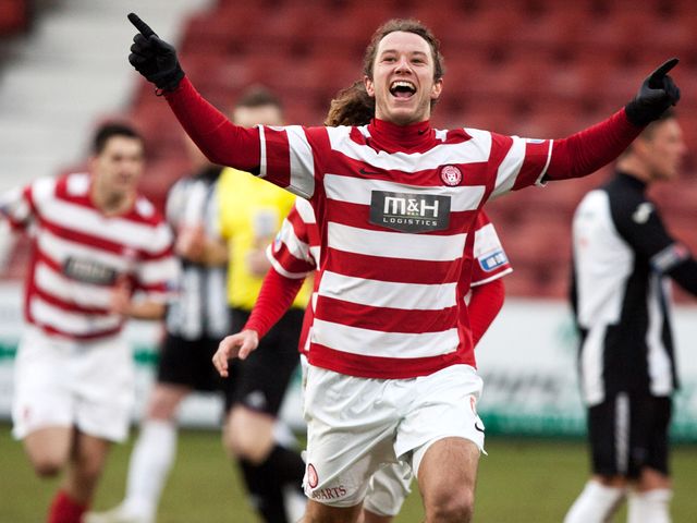 Steven May celebrates.